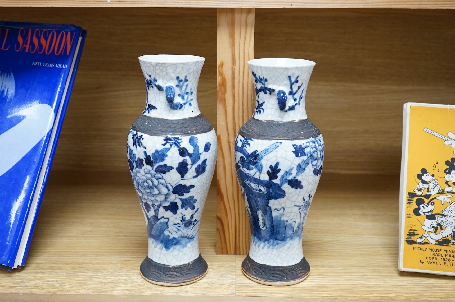 A pair of Chinese blue and white crackleware baluster vases, early 20th century, 26cm high